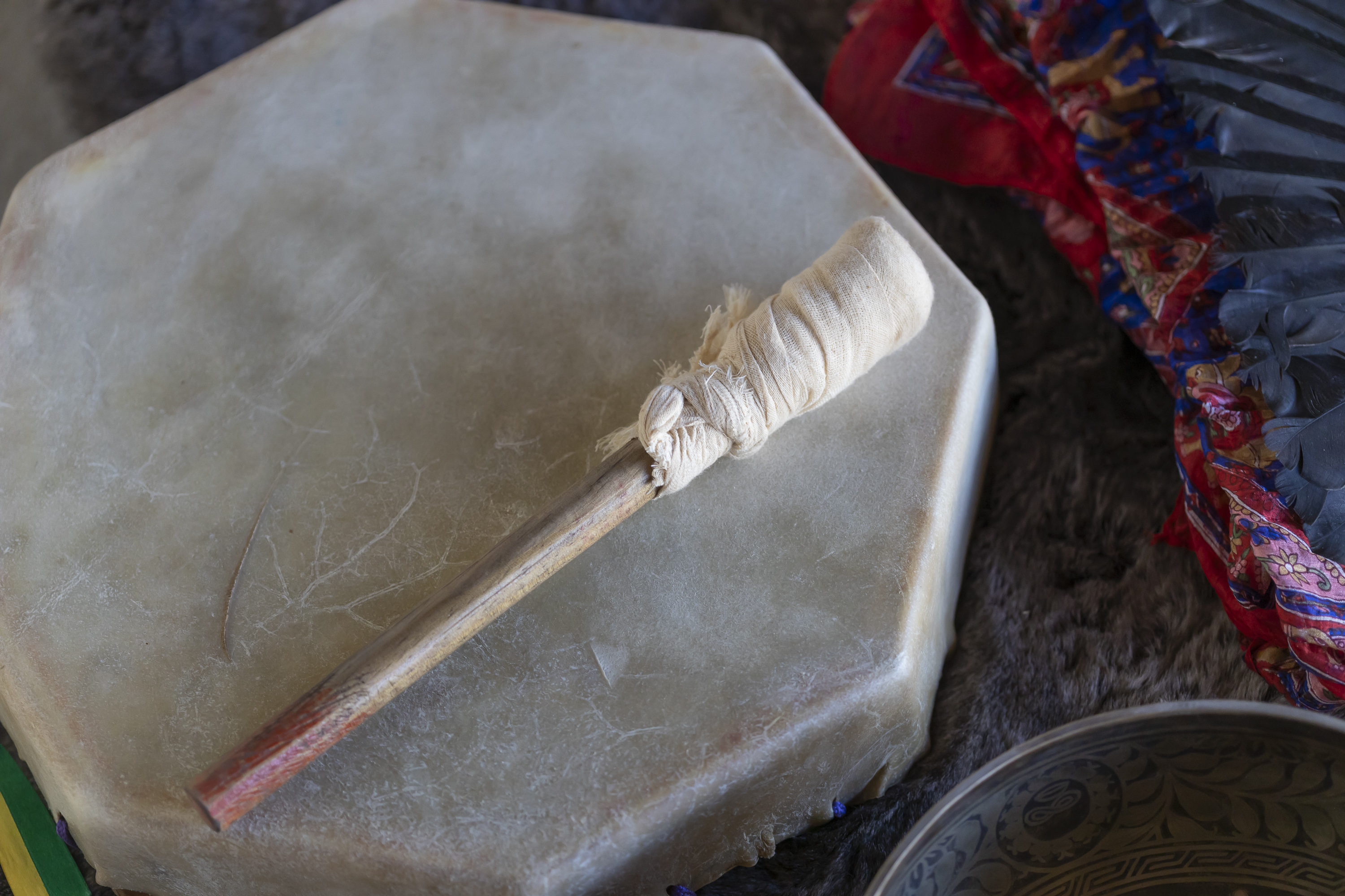 Hand drum detail from a Camp Cabo sound and ceremony setup.